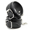 Наручники из экокожи DS Fetish Wrist Restraints чорні із сріблястою фурнітурою