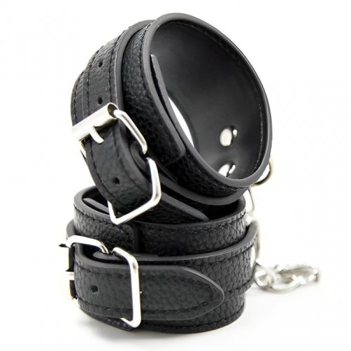 Наручники из экокожи DS Fetish Wrist Restraints чорні із сріблястою фурнітурою